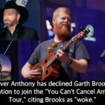 Oliver Anthony has declined Garth Brooks’ invitation to join the “You Can’t Cancel America Tour,” citing Brooks as “woke.”